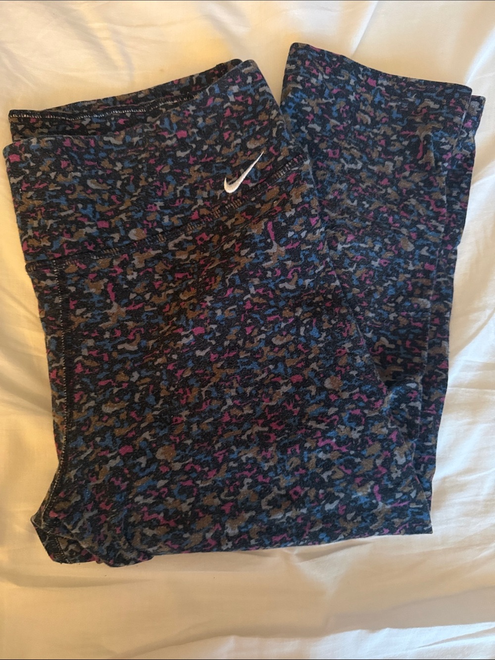 Nike Women's Dark Heathered Leggings with Pink, Blue & Gray Pattern